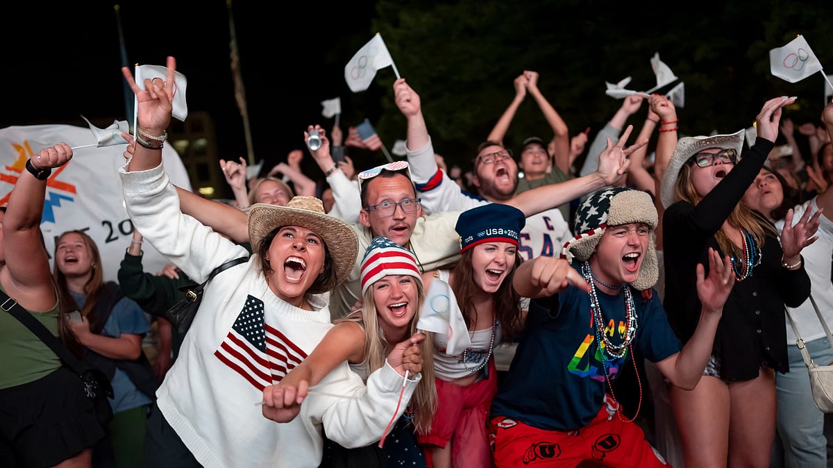 (AP Photo/Spenser Heaps) : People celebrate while watching a live feed from Paris at the moment the International Olympic Committee awarded Salt Lake City the 2034 Winter Olympics, Wednesday, July 24, 2024, in Salt Lake City. 
